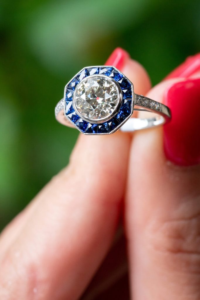 halo gemstone engagement ring