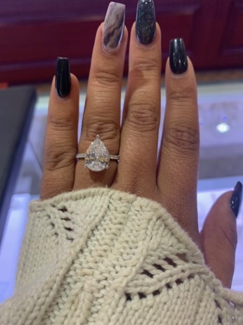 pear cut diamond engagement ring worn