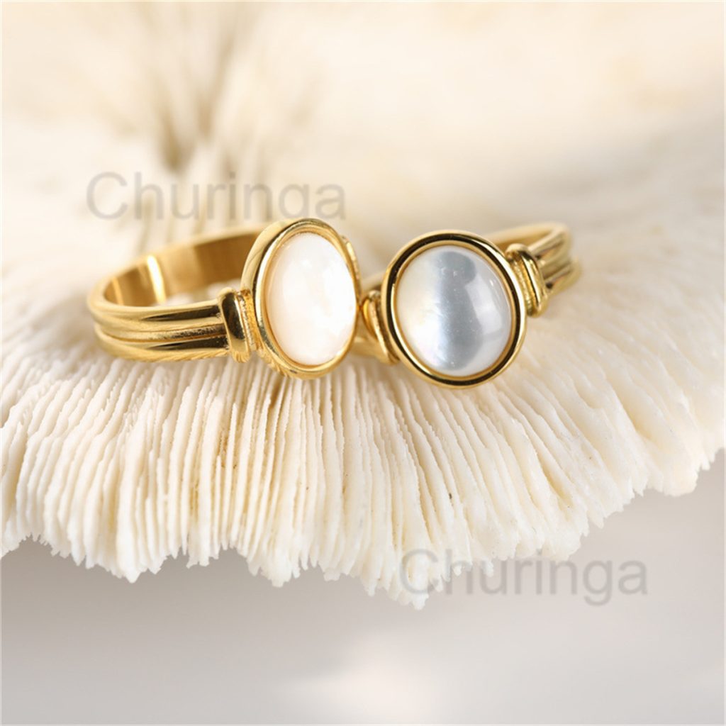 Stainless steel gold-plated oval white shell ring